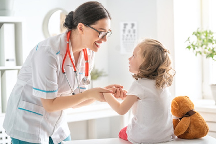 Doctor examining a child